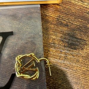 Louis Vuitton logo earrings
